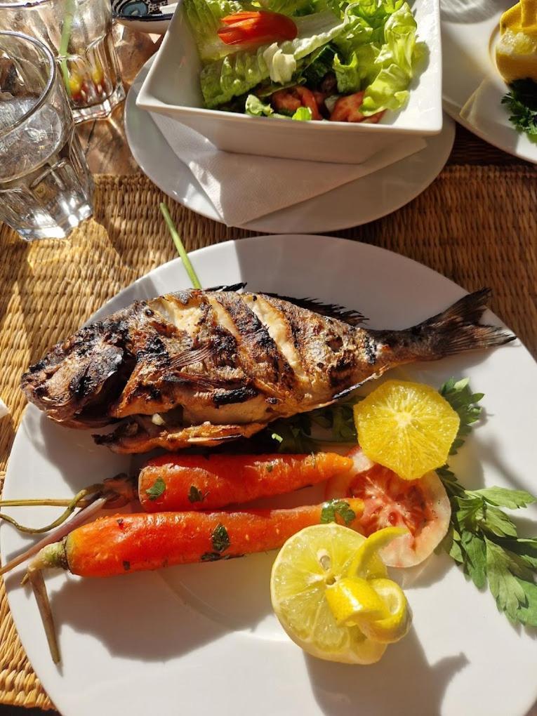L'Artisan Hotel Harqalah Buitenkant foto